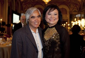 Photojournalist Nick Ut and Kim Phuc Phan Thi pose for pictures at the 