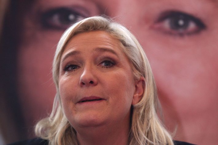 French far-right leader and National Front Party, Marine Le Pen, addresses the media during a news conference, Monday, Dec. 7, 2015, in Lille, northern France. France's far-right National Front ran strongly in a first-round regional vote that was the first election since an attack by Islamic extremists left 130 dead in Paris. The National Front was leading in six of the 13 regions, including two where it was strongly ahead. (AP Photo/Michel Spingler)