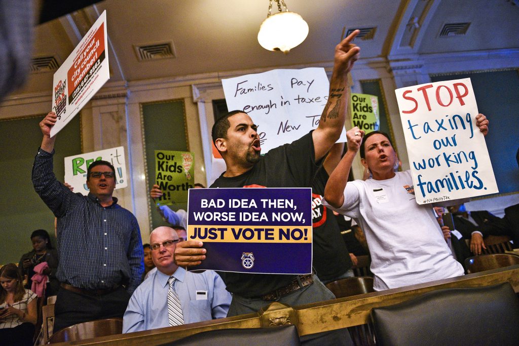 FILE -- Protesters shout their opposition to a proposed soda tax -- the proposal ultimately passed -- at a City Council hearing in Philadelphia, June 8, 2016. Soda tax proposals in several places have become expensive battles: Measures in just two California cities have drawn more money than that stateÕs Senate race and statewide referendums on marijuana legalization and gun control combined. (Charles Mostoller/The New York Times)
