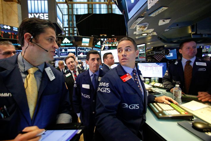 Traders work on the floor of the New York Stock Exchange (NYSE) in New York City, U.S., November 8, 2016. REUTERS/Brendan McDermid