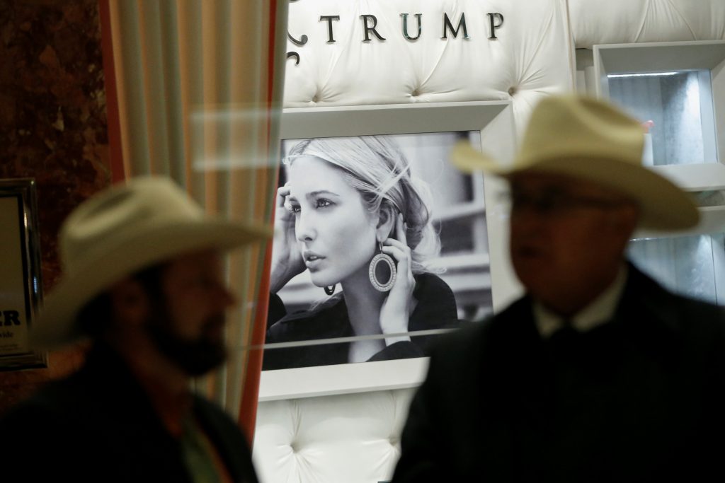 Two men in cowboy hats stand in the lobby at Trump Tower where U.S. President-elect Donald Trump lives in New York, U.S., November 29, 2016. REUTERS/Mike Segar FOR EDITORIAL USE ONLY. NO RESALES. NO ARCHIVES