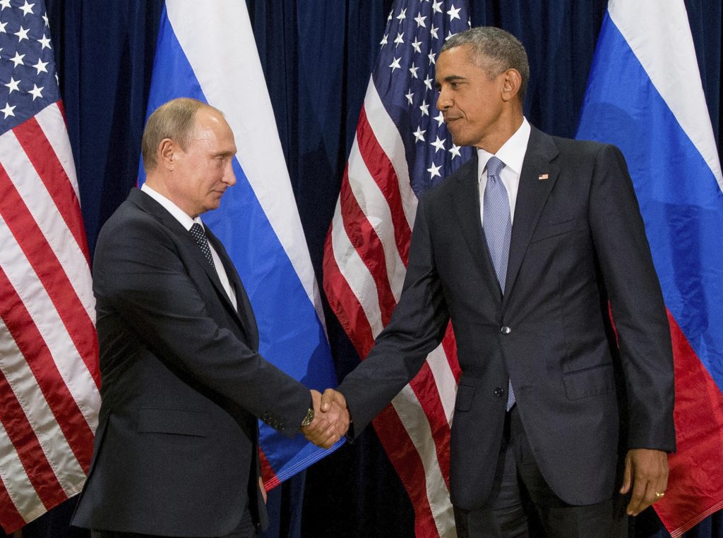 FILE - In this Sept. 28, 2015 file photo, President Barack Obama shakes hands with Russian President President Vladimir Putin before a bilateral meeting at United Nations headquarters. Obama has ordered intelligence officials to conduct a broad review on the election-season hacking that rattled the presidential campaign and raised new concerns about foreign meddling in U.S. elections, a White House official said Friday. White House counterterrorism and Homeland Security adviser Lisa Monaco said Obama ordered officials to report on the hacking of Democratic officials’ email accounts and Russia’s involvement. (AP Photo/Andrew Harnik, File)