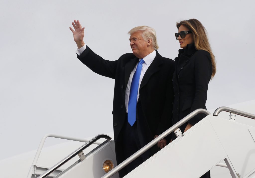 U.S. President-elect Donald Trump and his wife Melania arrive at Joint Base Andrews outside Washington, U.S. January 19, 2017, one day before his inauguration as the nation's 45th president. REUTERS/Jonathan Ernst