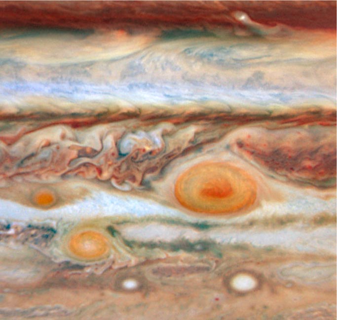 Pontos vermelhos na atmosfera de Júpiter. Foto: Nasa, AEE