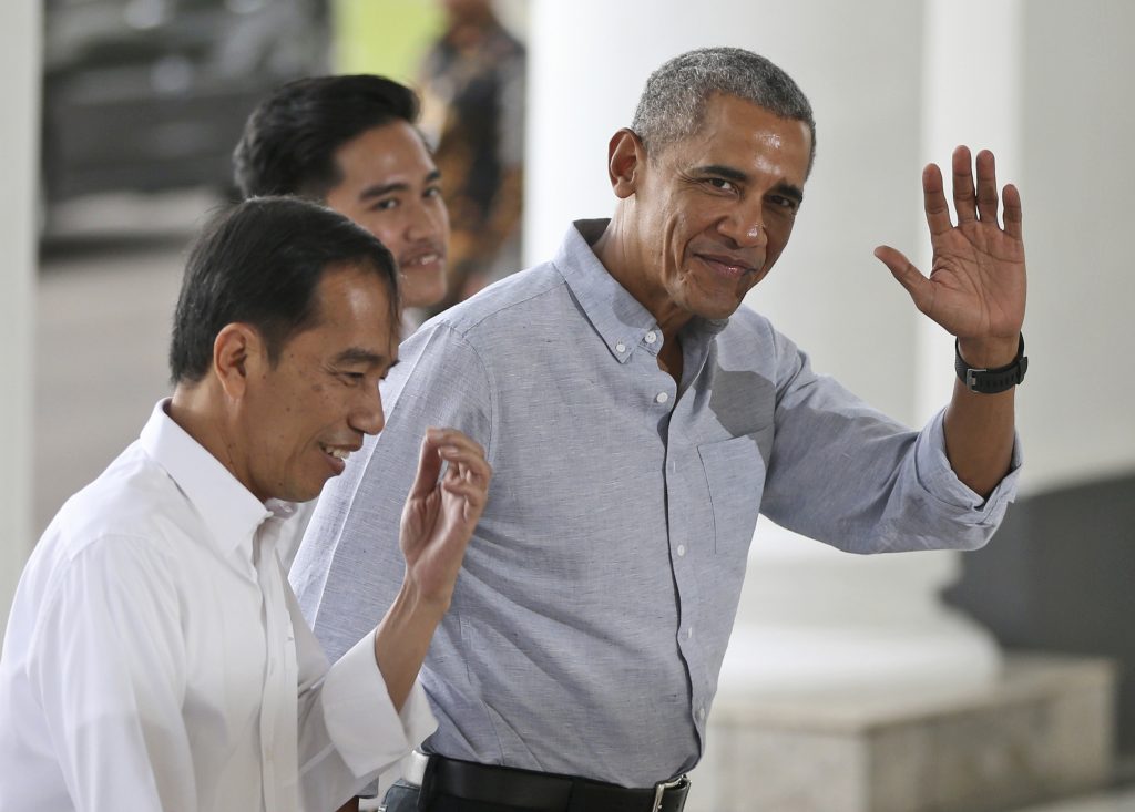 O tuíte de Barack Obama também é um dos mais populares da história da rede social quanto ao número de compartilhamentos (Foto: AP Photo/Dita Alangkara)